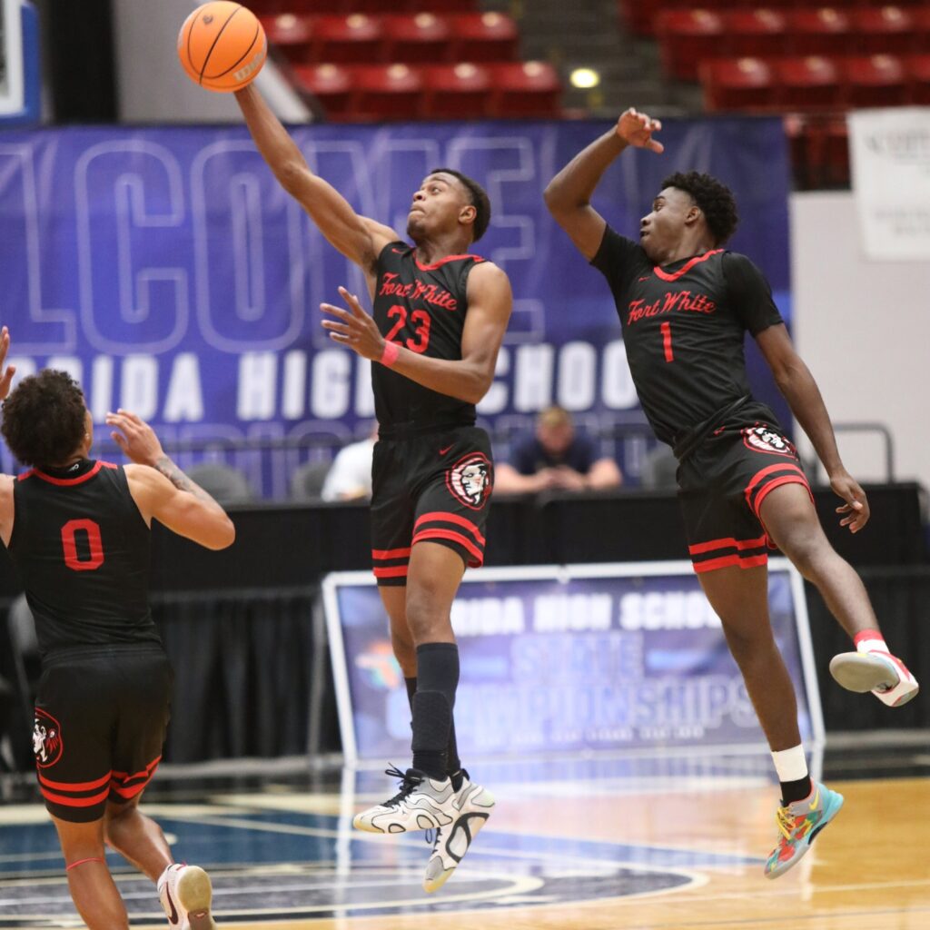 Fort White's Kendal Henry (23) with a fourth-quarter steal against Crossroad Academy (Quincy) in the Rural State Semifinals. Photo by C.J. Gish