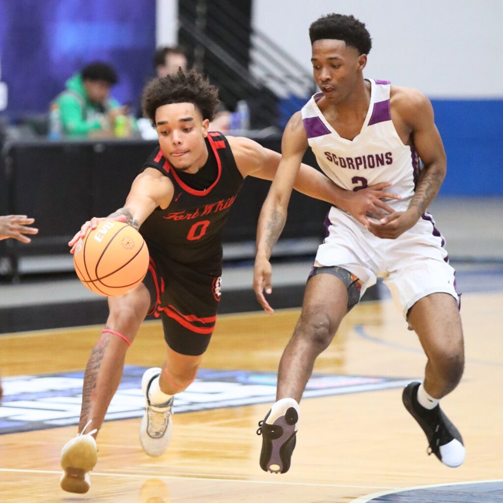 Fort White's Tafari Moe (0) goes after a loose ball against Crossroad Academy (Quincy) in the Rural State Semifinals. Photo by C.J. Gish