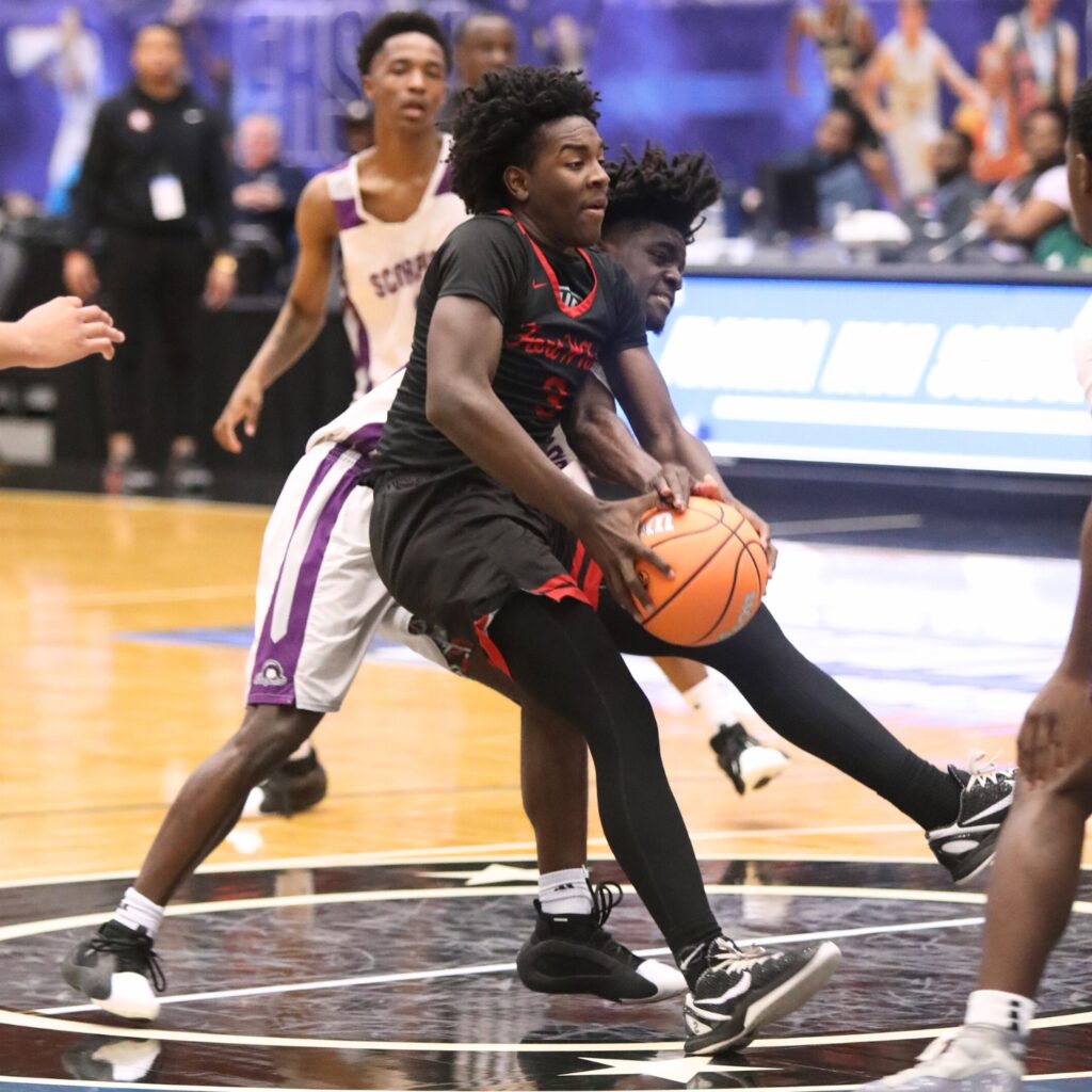 Fort White's Tre Halloway (3) drives to the basket against Crossroad Academy (Quincy) in the Rural State Semifinals. Photo by C.J. Gish