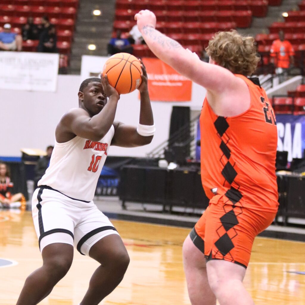 Hawthorne's Kyler Ingram (10) puts up a shot against Graceville in the Rural State Semifinals. Photo by C.J. Gish