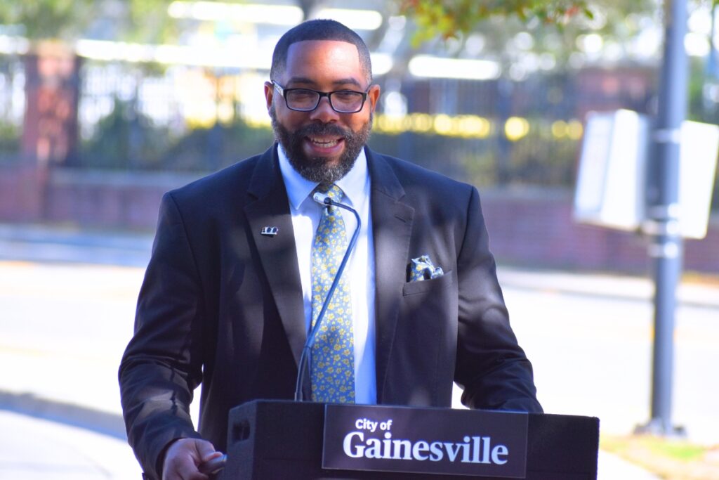 John Alexander speaks at the Rosa Parks Day event.