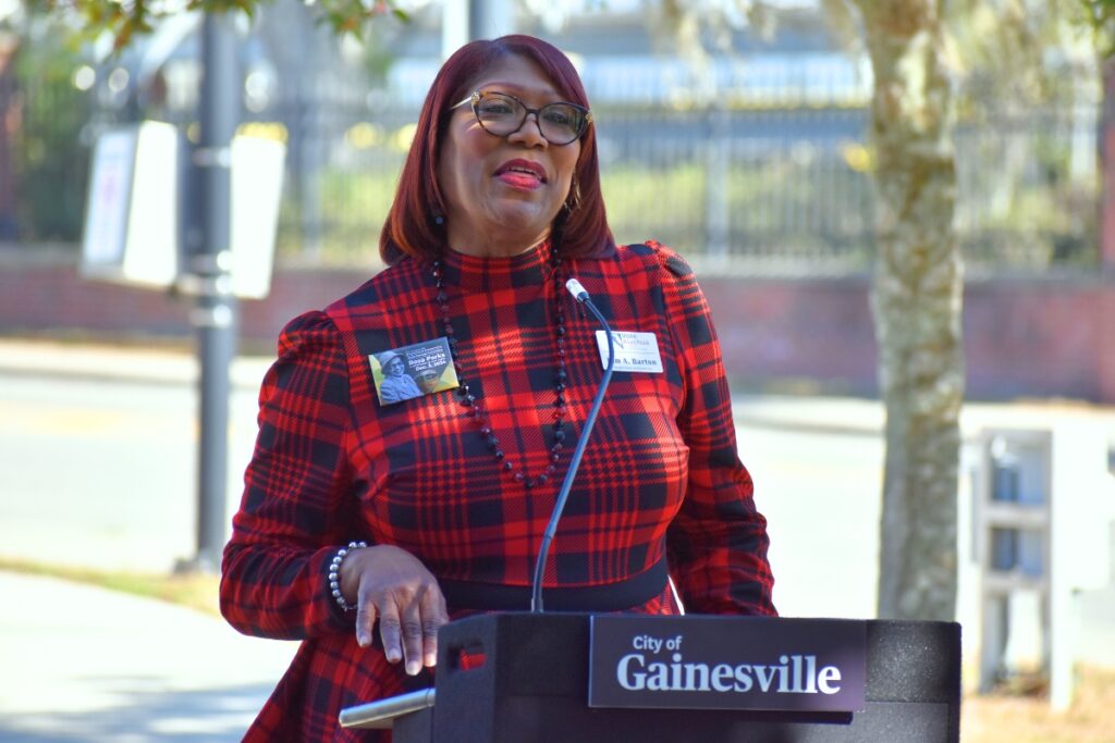 Kim Barton speaks at the Rosa Parks Day event.