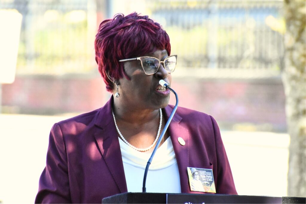 Martin Luther King, Jr. Commission of Florida chaplain Marie Herring speaks at the Rosa Parks Day celebration.