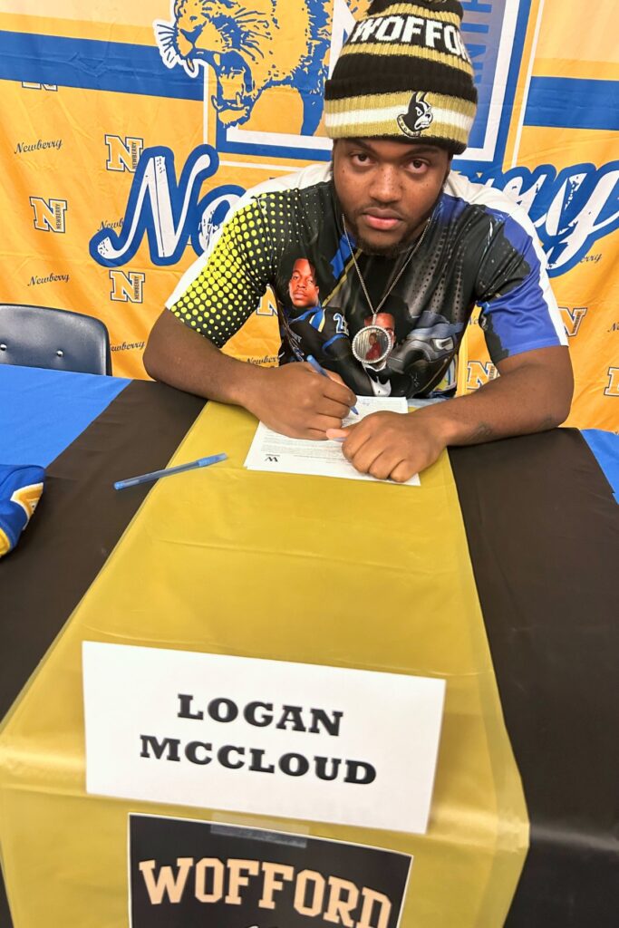 Newberry's Logan McCloud signed his letter of intent on Tuesday to play football at Wofford College. Courtesy of Ed Johnson
