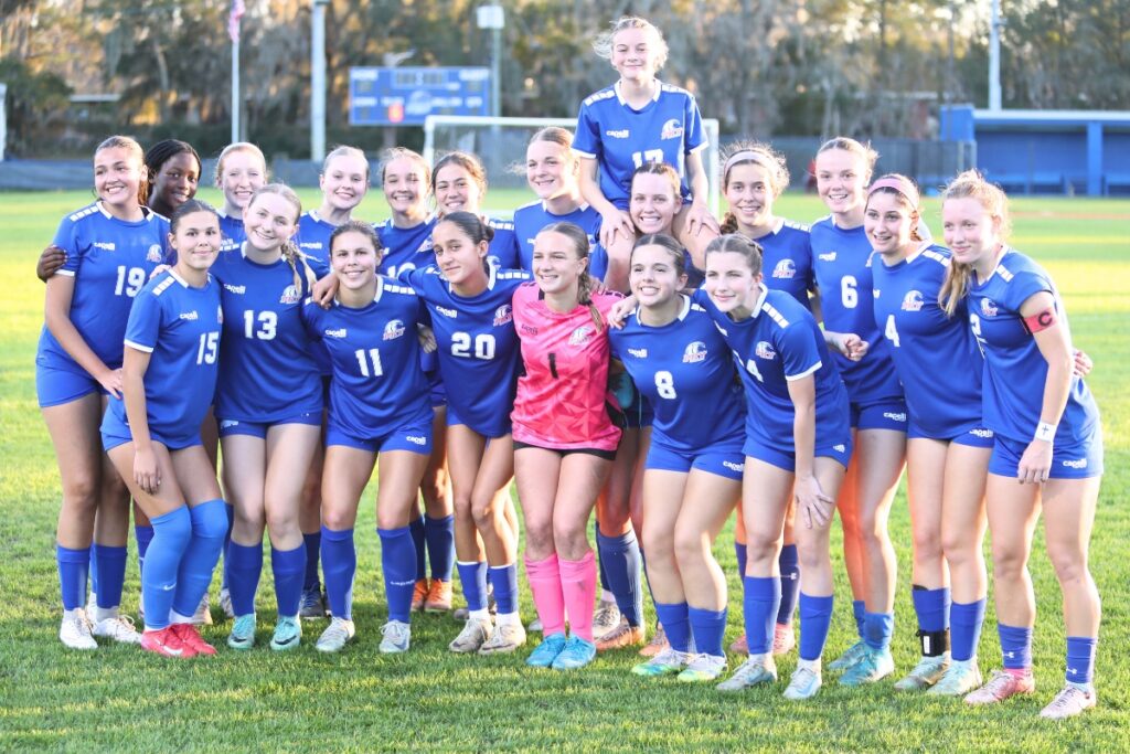 P.K. Yonge girls celebrate after defeating Lafayette, 8-0, in the 2A Region-1 Quarterfinals. Photo by C.J. Gish