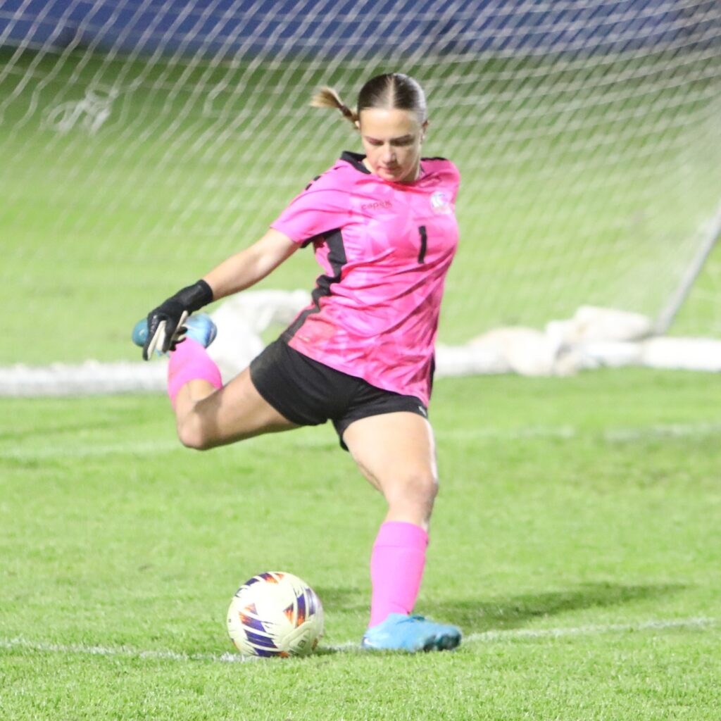 P.K. Yonge goalkeeper Norah Pancoast (1) kicks the ball against Maclay (Tallahassee). Photo by C.J. Gish