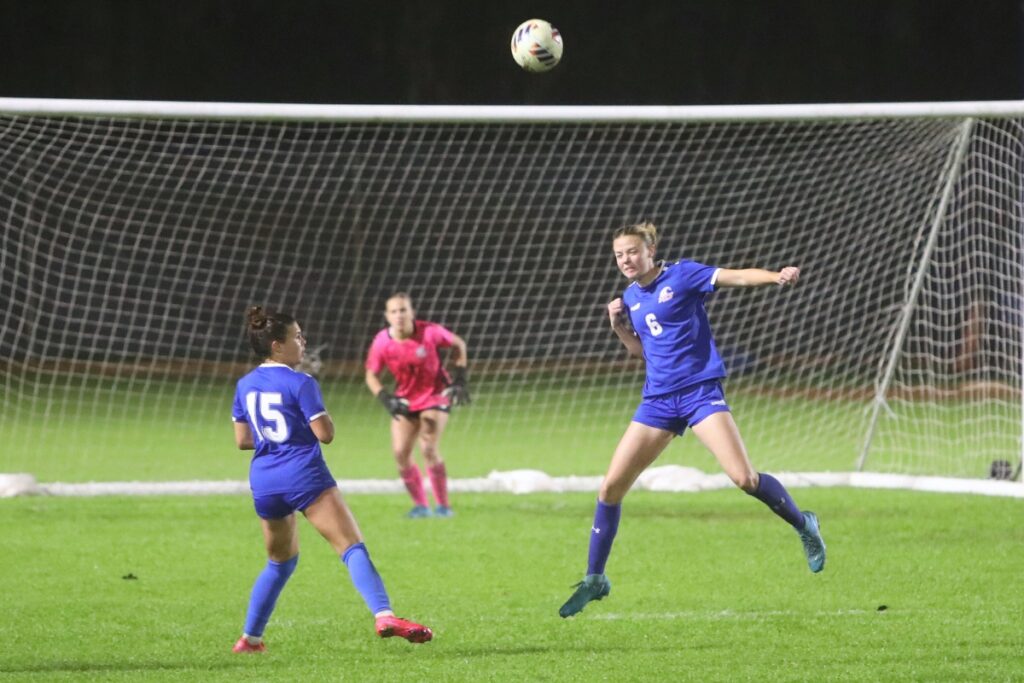 P.K. Yonge's Emma Mansfield (6) with a header against the Episcopal School of Jacksonville. Photo by C.J. Gish