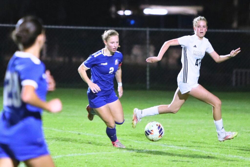 P.K. Yonge's Faith Hardy (2) dribbles the ball against Maclay (Tallahassee). Photo by C.J. Gish