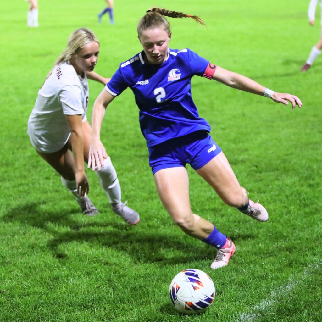 P.K. Yonge's Faith Hardy (2) goes after the ball against the Episcopal School of Jacksonville. Photo by C.J. Gish