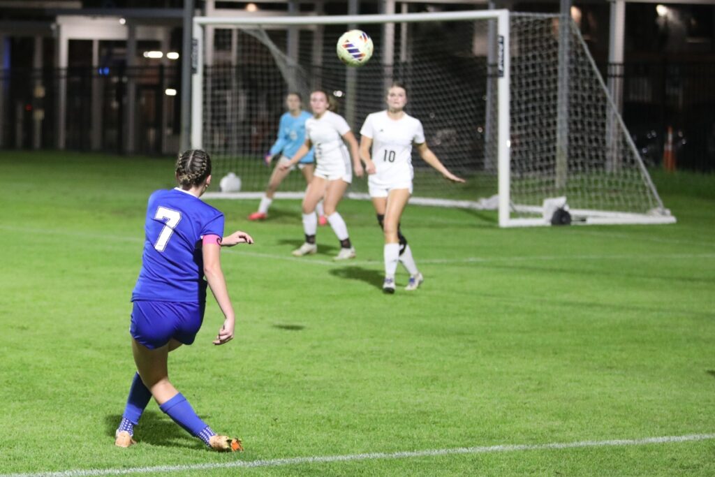 P.K. Yonge's Mae Dodd (7) with a shot on goal against Maclay (Tallahassee). Photo by C.J. Gish