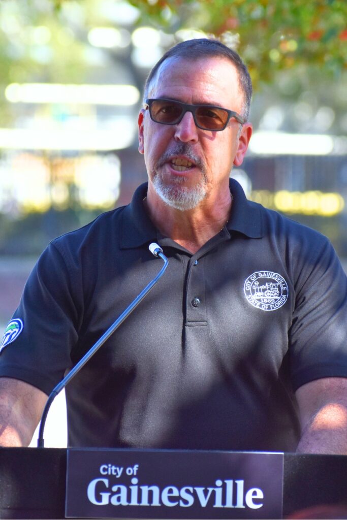 Thomas Idoyaga speaks at the Rosa Parks Day event.