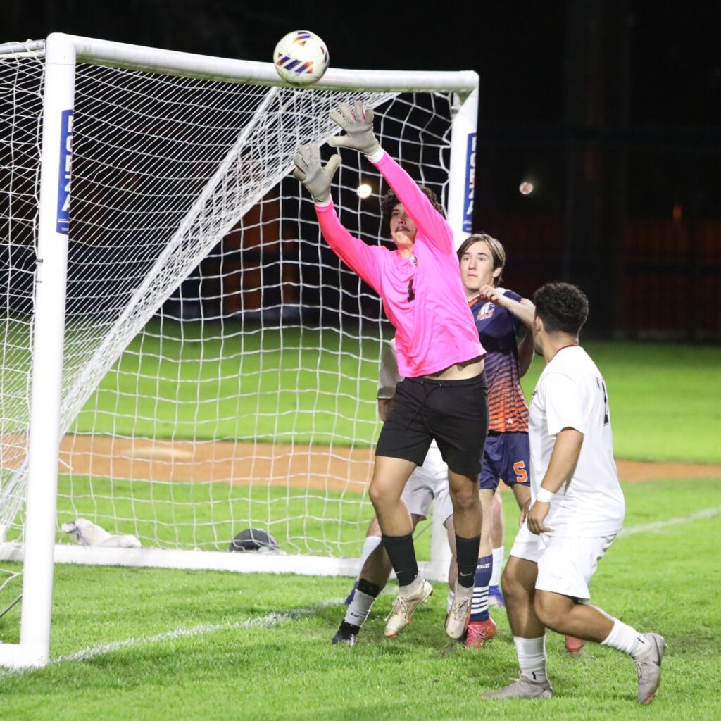 Williston goalkeeper Logan Navarro (1) with a corner kick save against P.K. Yonge. Photo by C.J. Gish