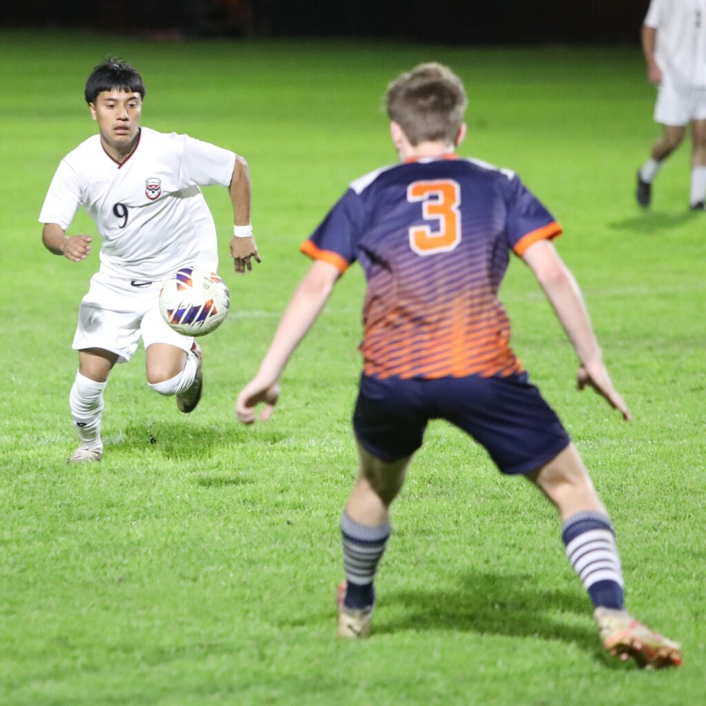 Williston's Dary Osorio-Lopez (9) goes after the ball against P.K. Yonge. Photo by C.J. Gish