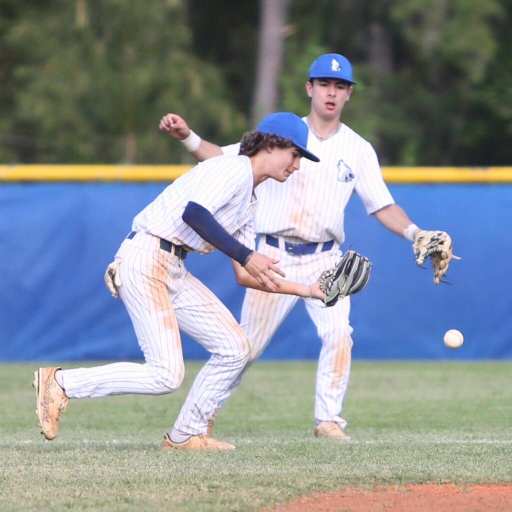 A P.K. Yonge fly ball pops out of St. Francis Catholic's Sawyer Williams' mit in the fifth inning. Photo by C.J. Gish
