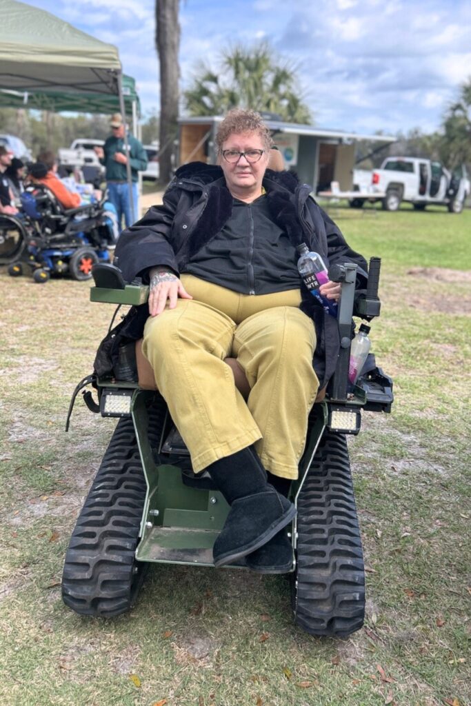 Aileen Phillips after she finished taking a spin on the Alachua Conservation Trust’s EcoRover. Photo by Ronnie Lovler 