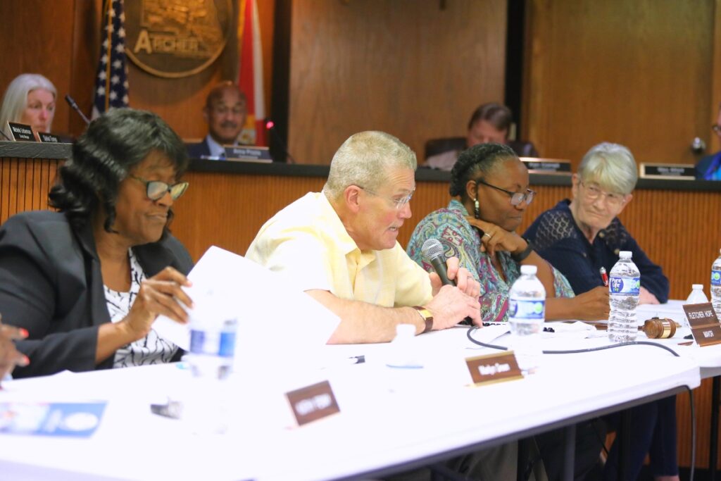 Archer Mayor Fletcher Hope speaks at a joint meeting with the Alachua County Board of County Commissioners. Photo by Seth Johnson