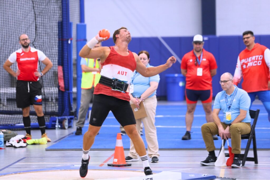 Armin Beham throws a 14.22-meter shot put. Photo by Seth Johnson