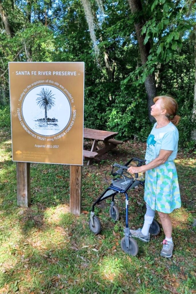 Elizabeth Byrd, who has spina bifida, uses her rollator to walk. the trails of Florida parks. Photo courtesy of Elizabeth Byrd