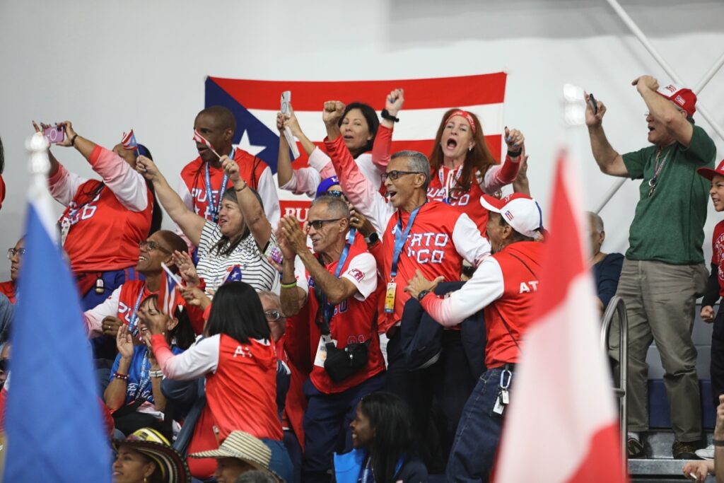 Fans cheer as Puerto Rico gets announced in the Parade of Nations. 