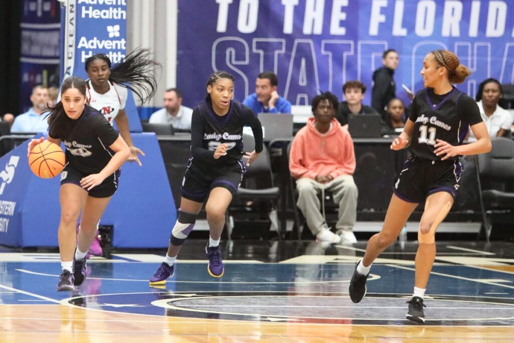 Gainesville's Catalina Giraldo Vergara (20) brings the ball downcourt against Northeast (Oakland Park) in the Class 5A state semifinals. Photo by C.J. Gish