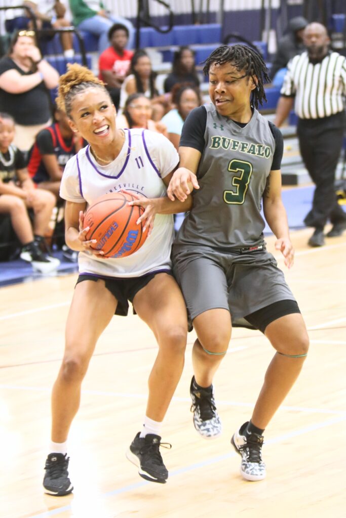 Gainesville's Jayden Terry (left) drives to the basket against The Village's Zion McRae at The Prep Zone All-Star Showcase. Photo by C.J. Gish