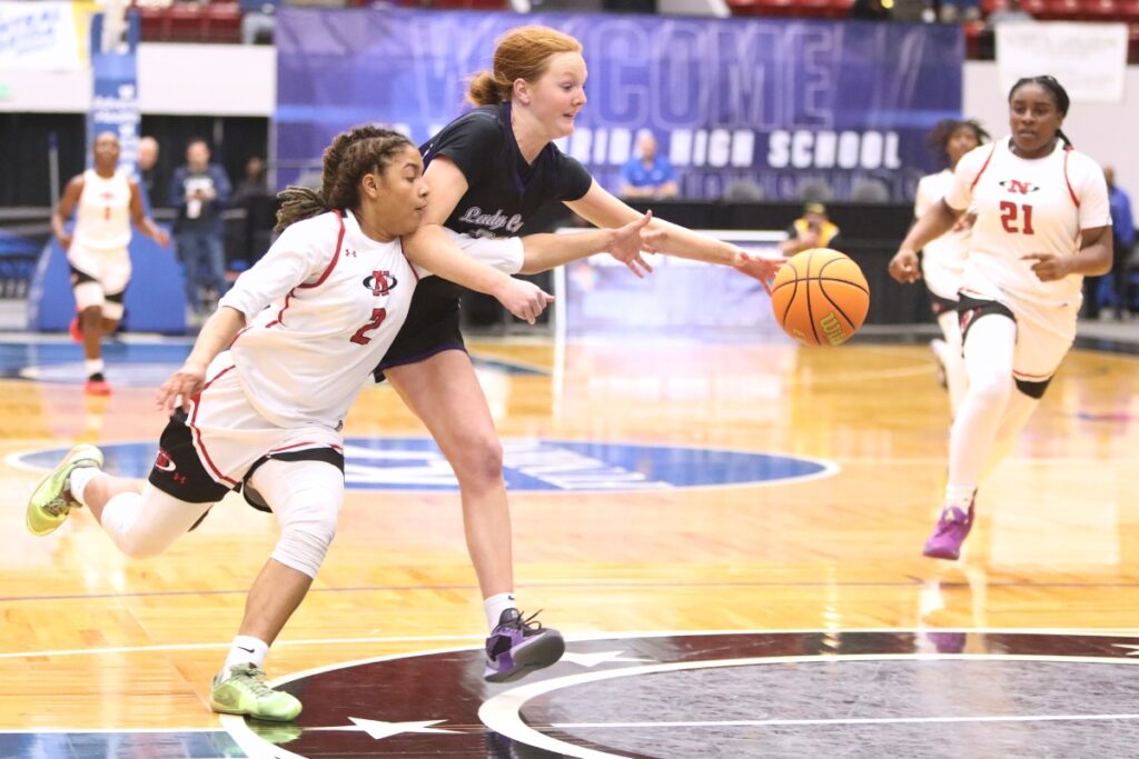 Gainesville's Sarah Collins (21) goes after a long inbound pass on the final play against Northeast (Oakland Park) in the Class 5A state semifinals. Photo by C.J. Gish