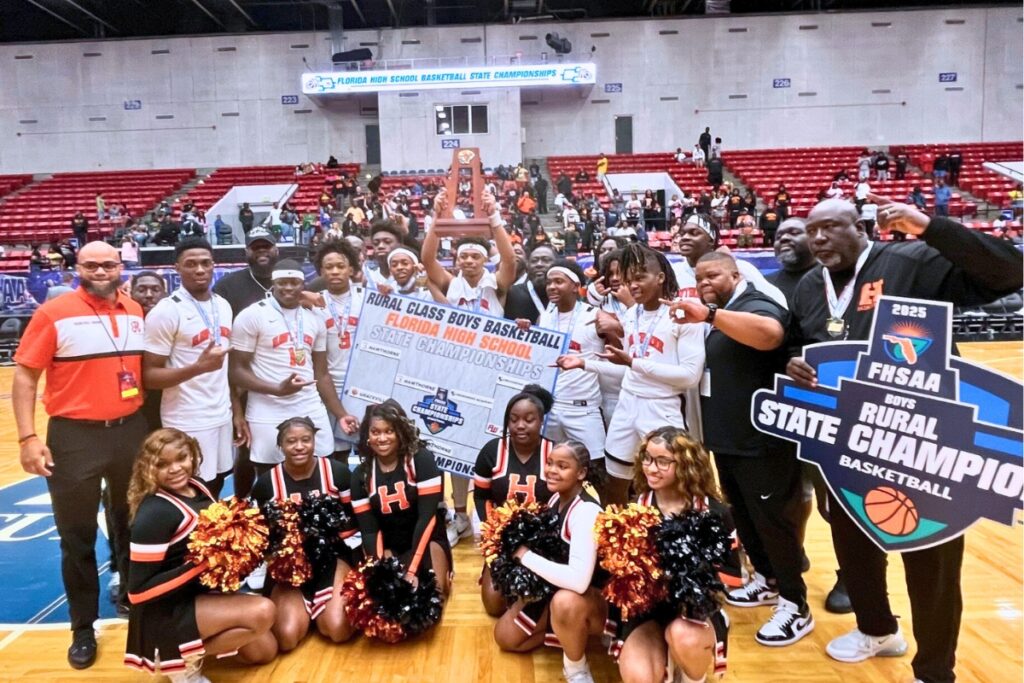 Hawthorne celebrates its basketball state title on Friday night. Photo by Mike Ridaught