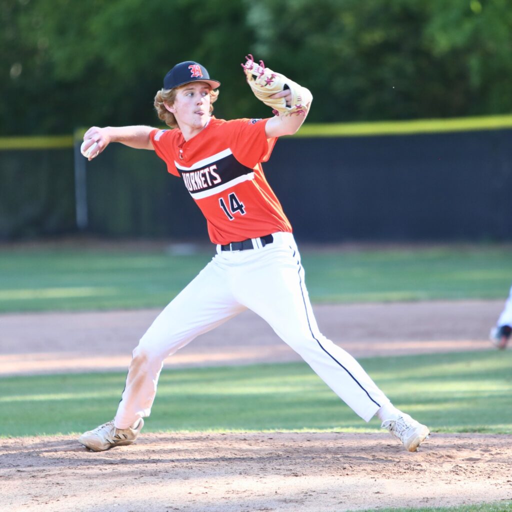 Hawthorne's Tison Thomas with a pitch against Oak Hall. Photo by C.J. Gish