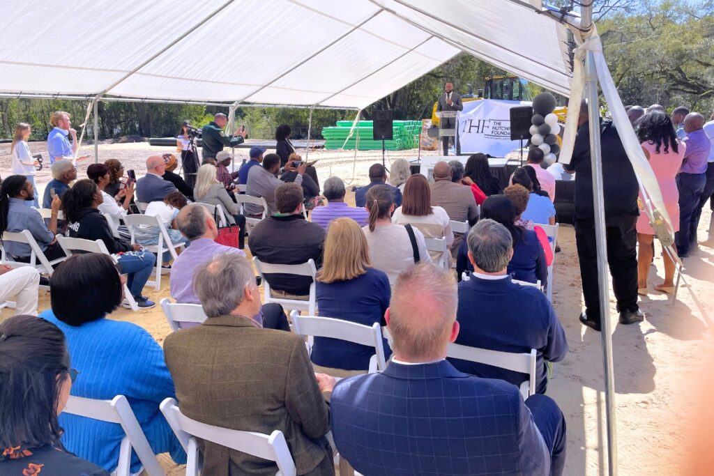 Kindrell Hutchinson speaks at Tuesday's groundbreaking ceremony for Jessie's Village. Photo by Seth Johnson