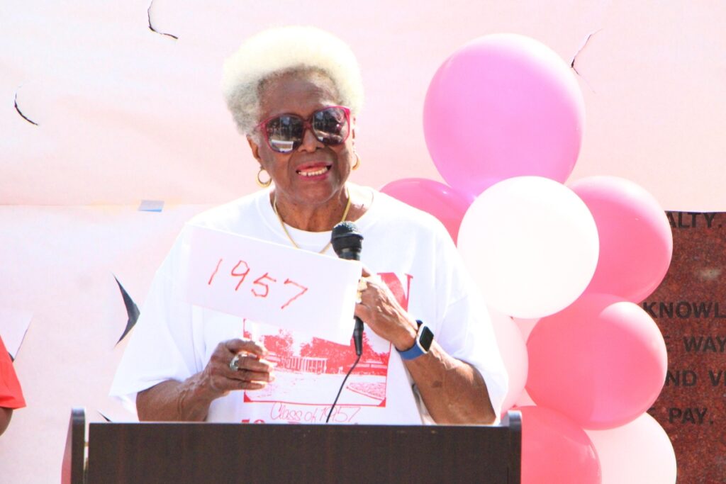 Lincoln High School class of 1957 graduate Liz Jenkins speaks at the memorial wall unveiling. Photo by Lillian Hamman