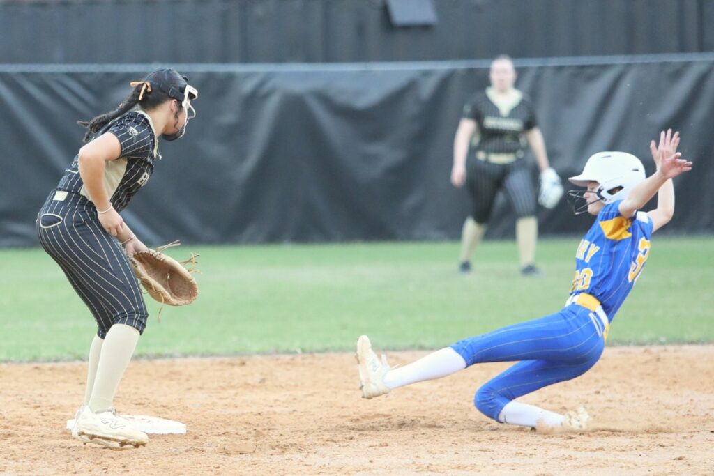 Newberry's Abbie Parker (30) slides safely to second against Buchholz in the fourth inning. Photo by C.J. Gish