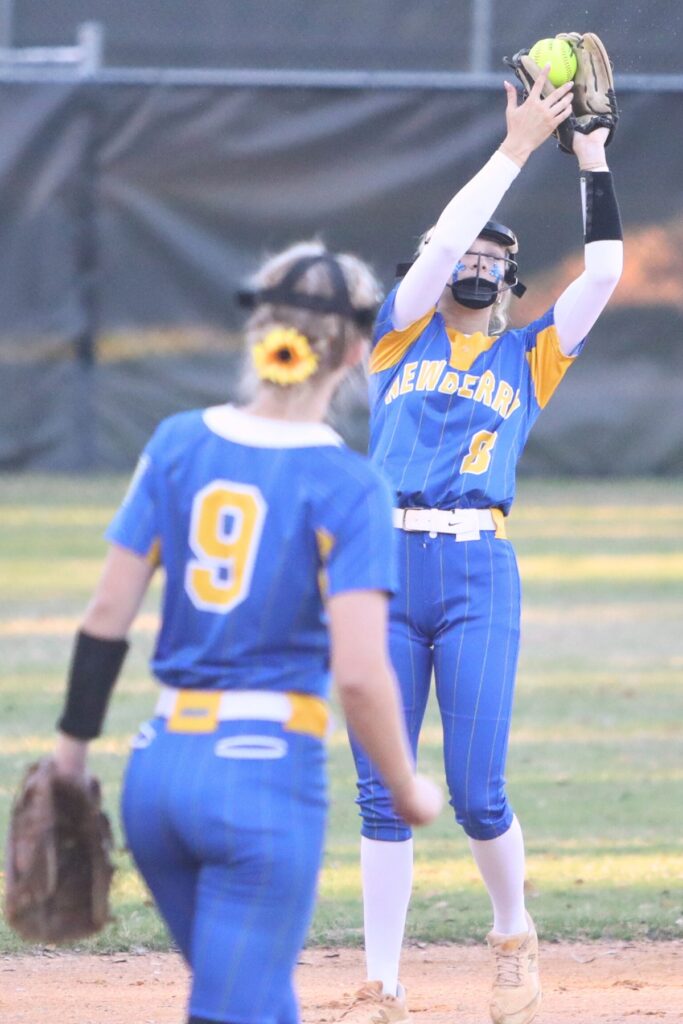 Newberry's Malana Kinnard (8) catches a pop-up hit for an out against Buchholz. Photo by C.J. Gish