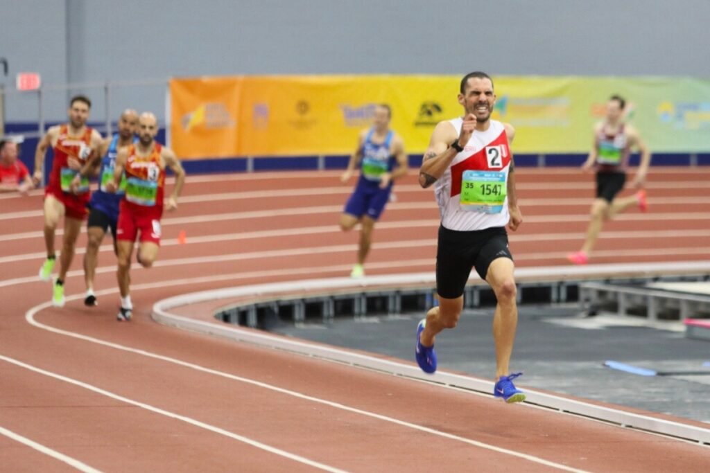 Peru's Vidal breaks away from the pack during a 800-meter heat for men ages 35 to 39. Photo by Seth Johnson