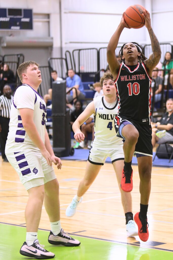 Williston's Xavier Kirkpatrick goes up for a basket at The Prep Zone All-Star Showcase. Photo by C.J. Gish
