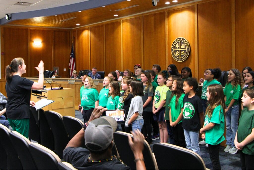 Alachua Elementary School students opened the Alachua City Commission meeting with a concert. Photo by Lillian Hamman