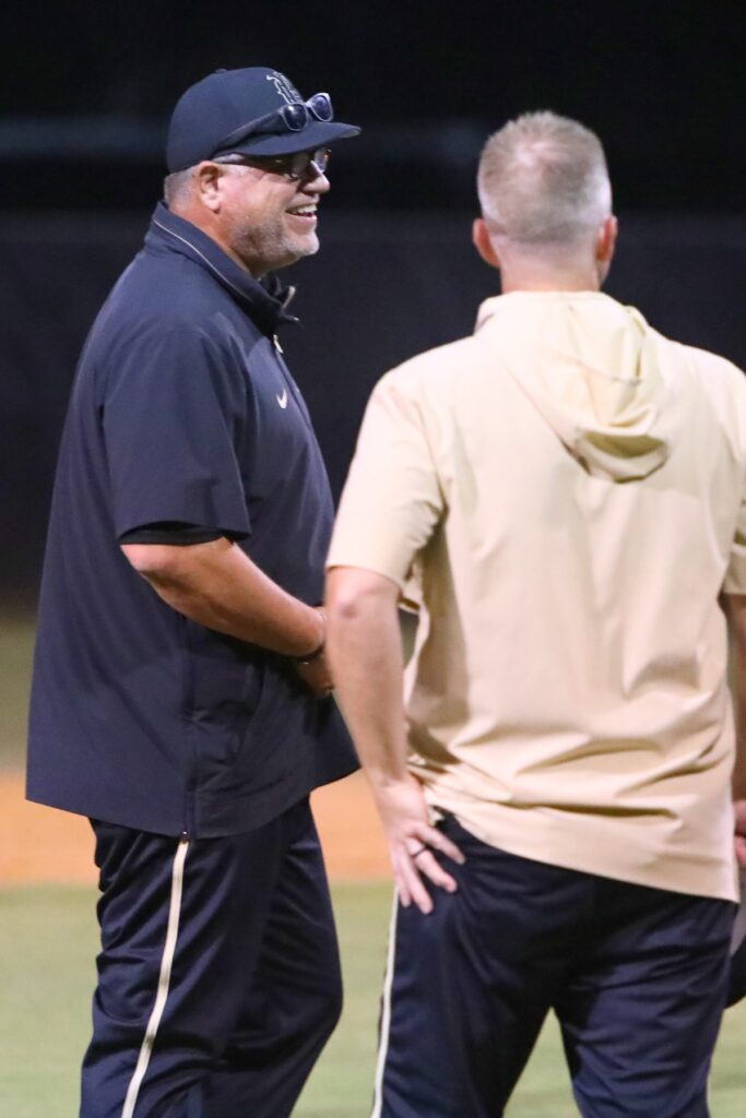 Buchholz coach Ron Brooks is all smiles after the Bobcats swept First Coast (Jacksonville) in a doubleheader in the 6A Region 1 Quarterfinals. Photo by C.J. Gish