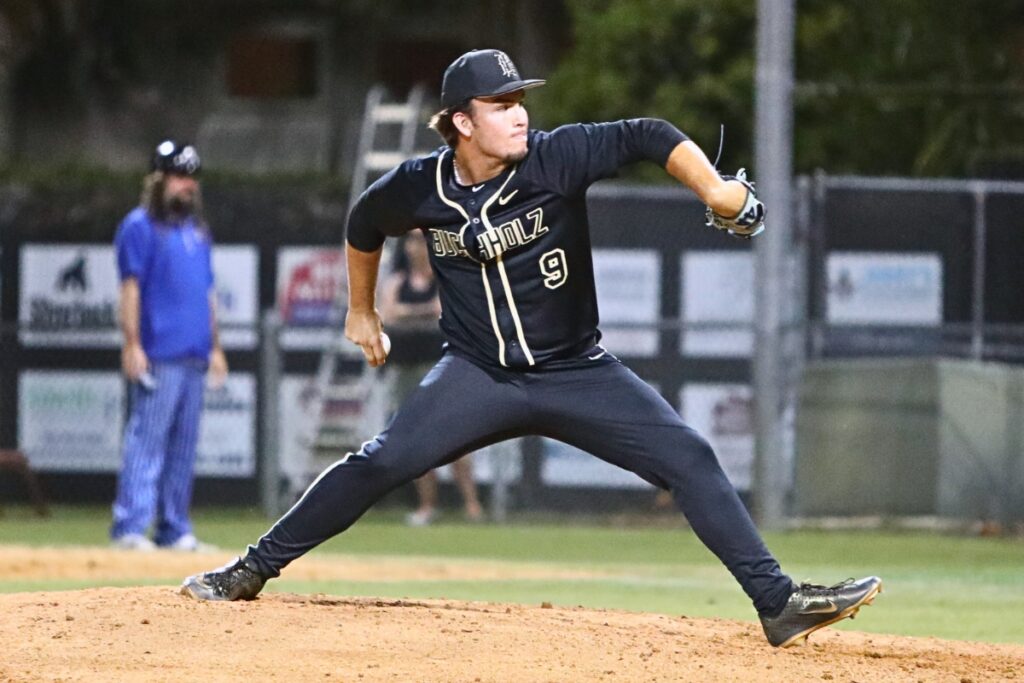 Buchholz's Wyatt Clarke with a pitch against First Coast (Jacksonville) in game two of the 6A Region 1 Quarterfinals. Photo by C.J. Gish