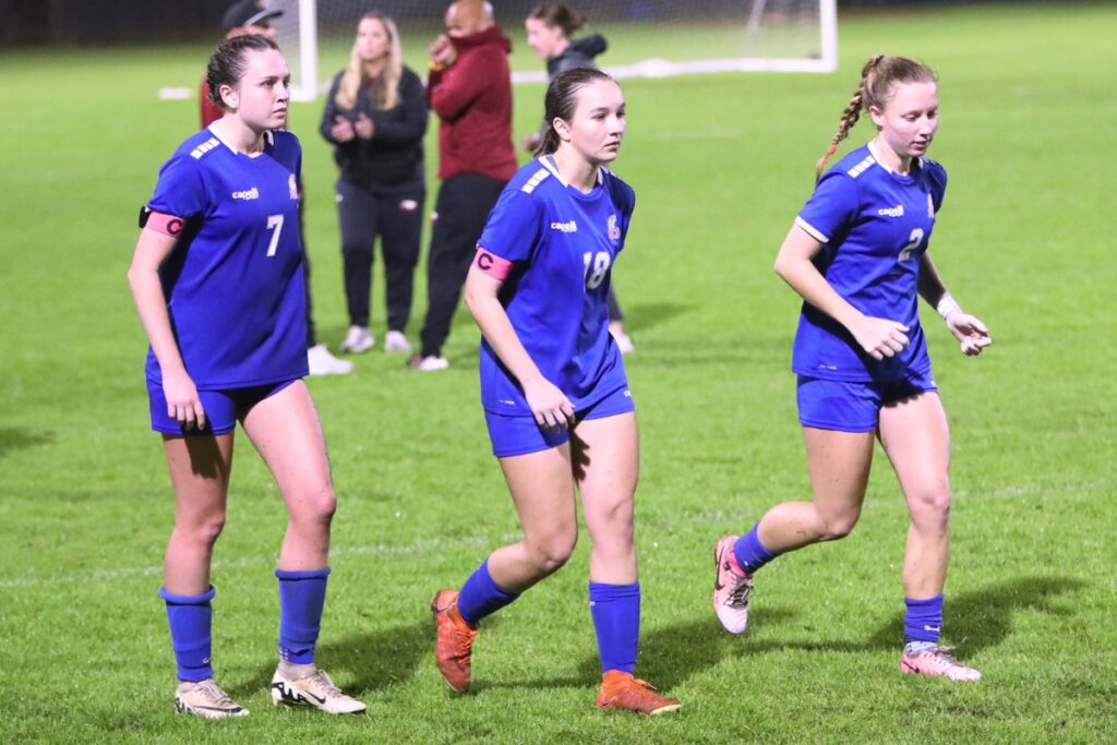 (From left) P.K. Yonge's Mae Dodd, Sydnie Colaw and Faith Hardy were named to the 2024-25 Bosshardt Realty All Area small school team. Photo by C.J. Gish