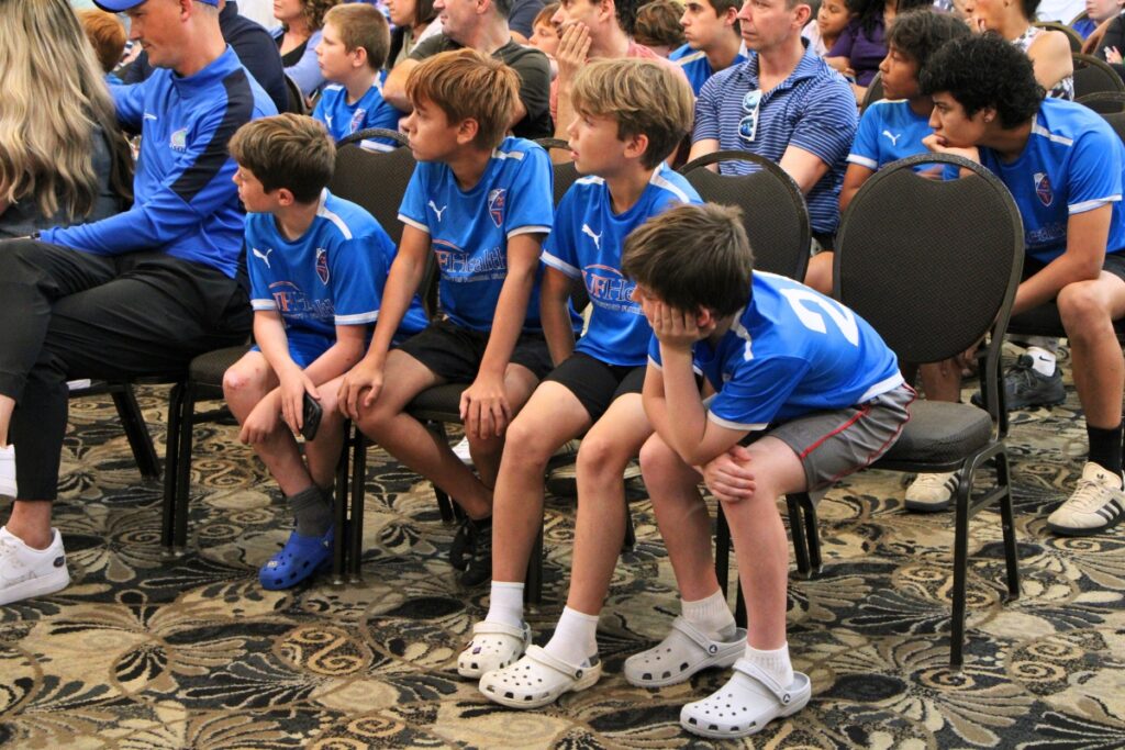 Gainesville Soccer Academy players attend town hall meeting. Photo by Lillian Hamman