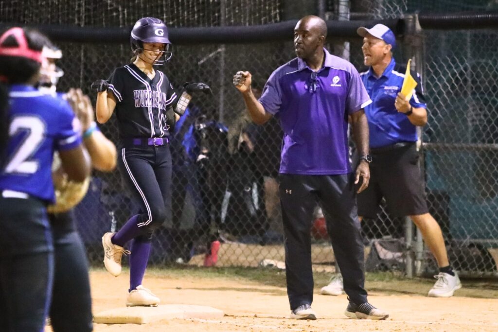 Gainesville's Lana Renicks (15) celebrates after hitting a one-run single in the fifth inning for a 3-1 lead over Belleview in the 5A District 5 Semifinals. Photo by C.J. Gish