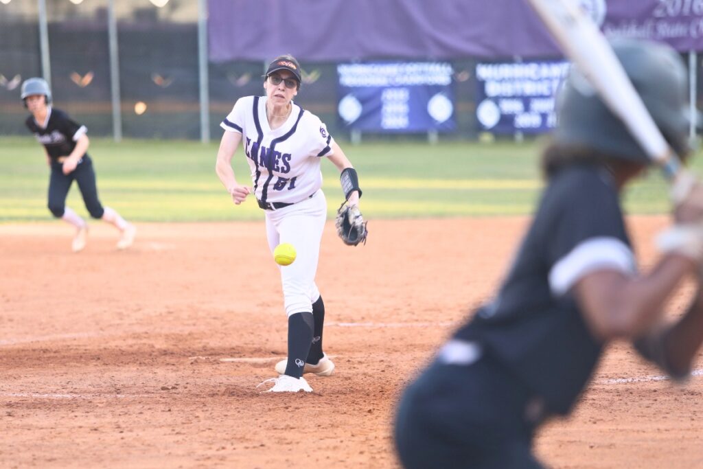 Gainesville's McKenna O’Sullivan (51) with a first-inning against Santa Fe.