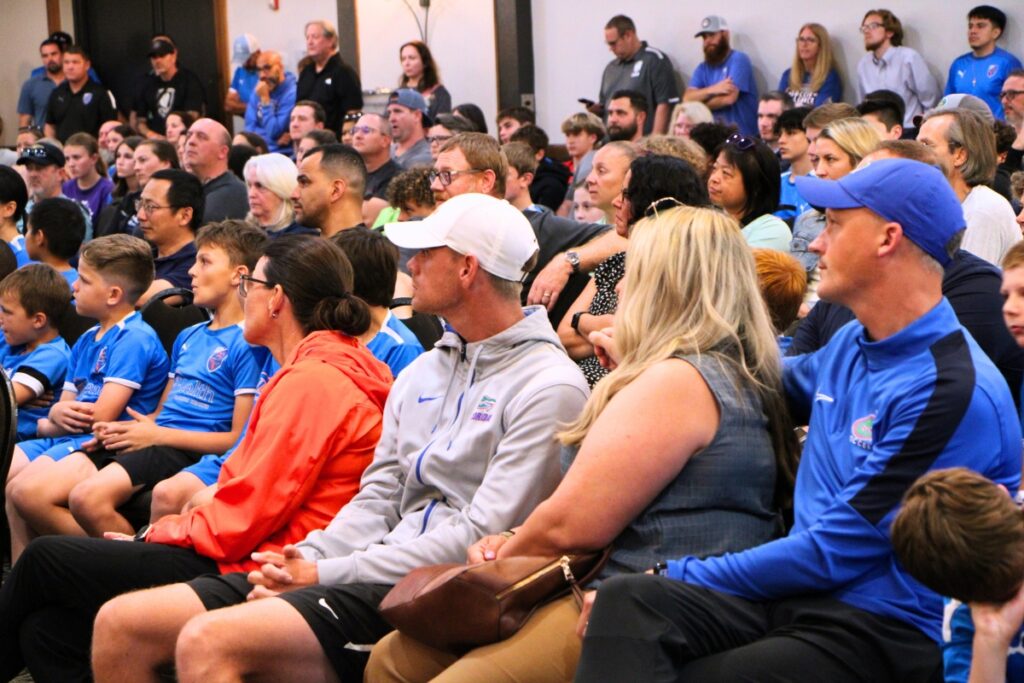 Members of the University of Florida soccer coaching staff attend Gainesville Soccer Academy town hall meeting. Photo by Lillian Hamman
