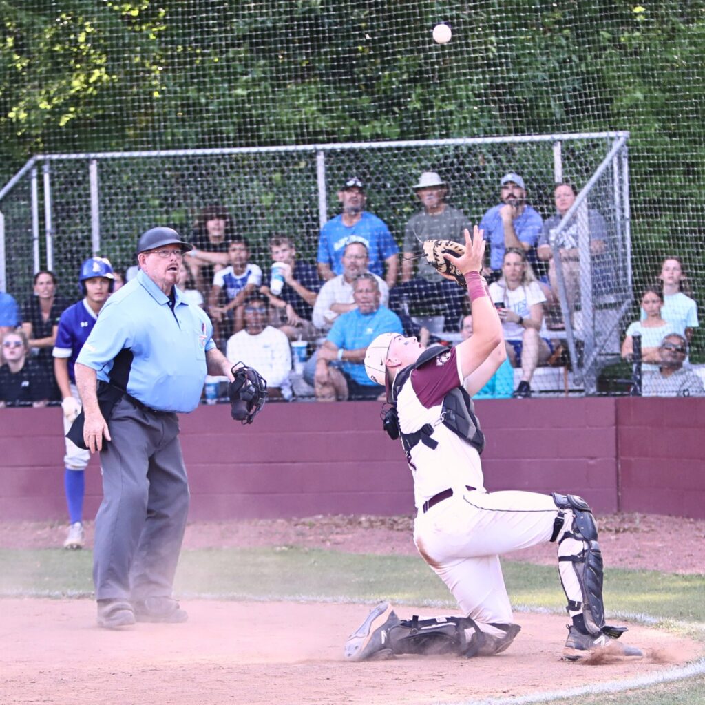 Oak Hall's Brody Beaupre catches a popped up sixth inning bunt for an out against St. Francis Catholic in game three of the 1A Region 2 Quarterfinals. Photo by C.J. Gish 1 (1)