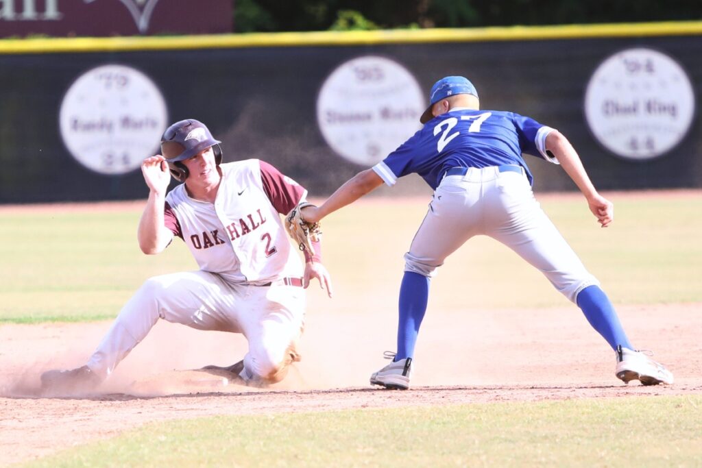 Oak Hall's Gavin Jones steals second base in the fifth inning against St. Francis Catholic's Andy Janelle in game three of the 1A Region 2 Quarterfinals. Photo by C.J. Gish