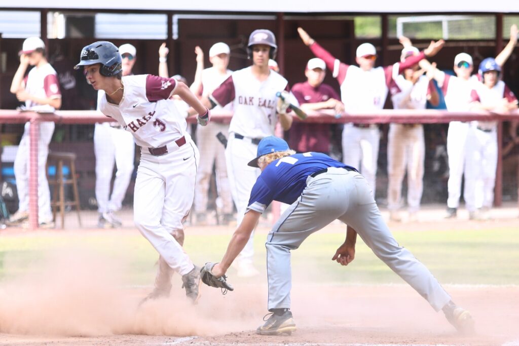 Oak Hall's Graham Rosenstone (3) scores in the third inning to put the Eagles ahead 5-4 against St. Francis Catholic in game three of the 1A Region 2 Quarterfinals. Photo by C.J. Gish