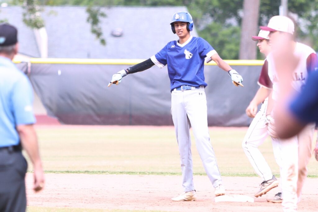 St. Francis Catholic's Colin Kuruppacherry hit a two-run double in the third inning to tie the game 3-3 against Oak Hall in game 3 of the 1A Region 2 Quarterfinals. Photo by C.J. Gish