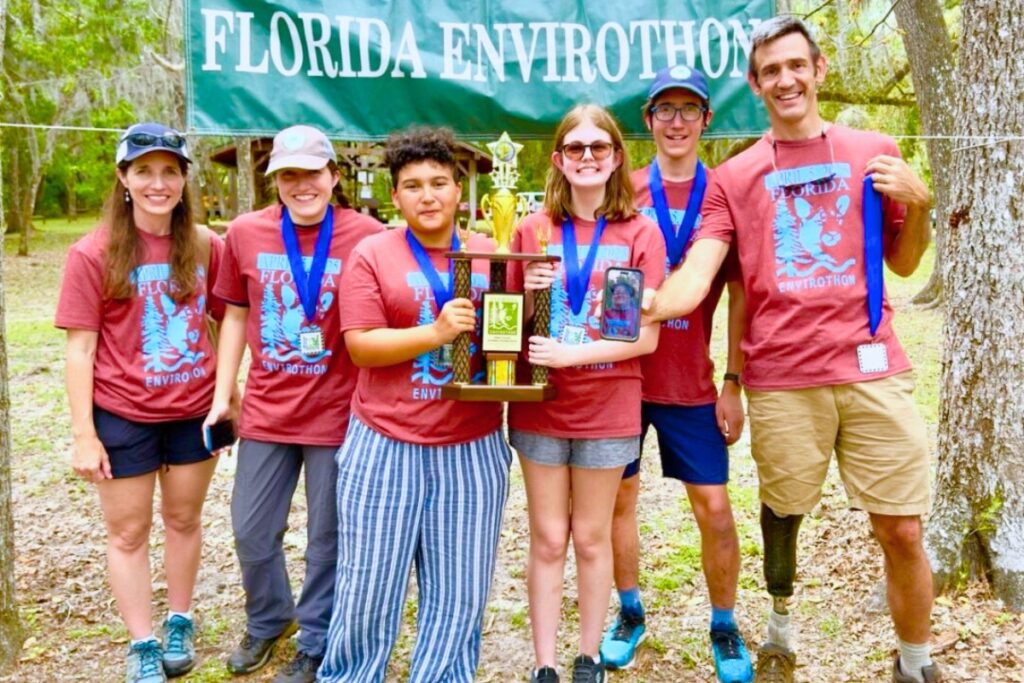 The Alachua County 4-H Envirothon team with its first-place trophy won at the 2025 Florida Environthon. Courtesy of Jonathan Pruden