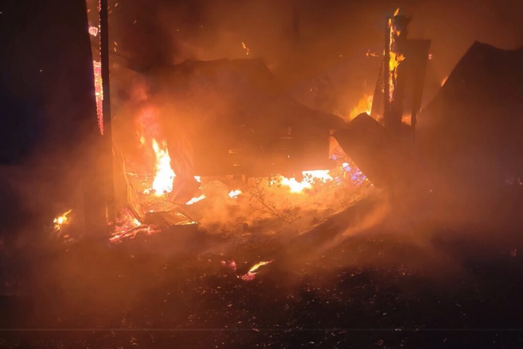 The High Springs Fire Department arrived to find the pole bark engulfed in flames. 