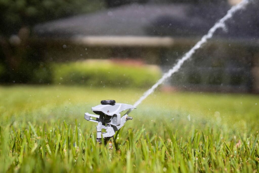 A residential lawn gets sprinkled. Photo by Tyler Jones UF-IFAS