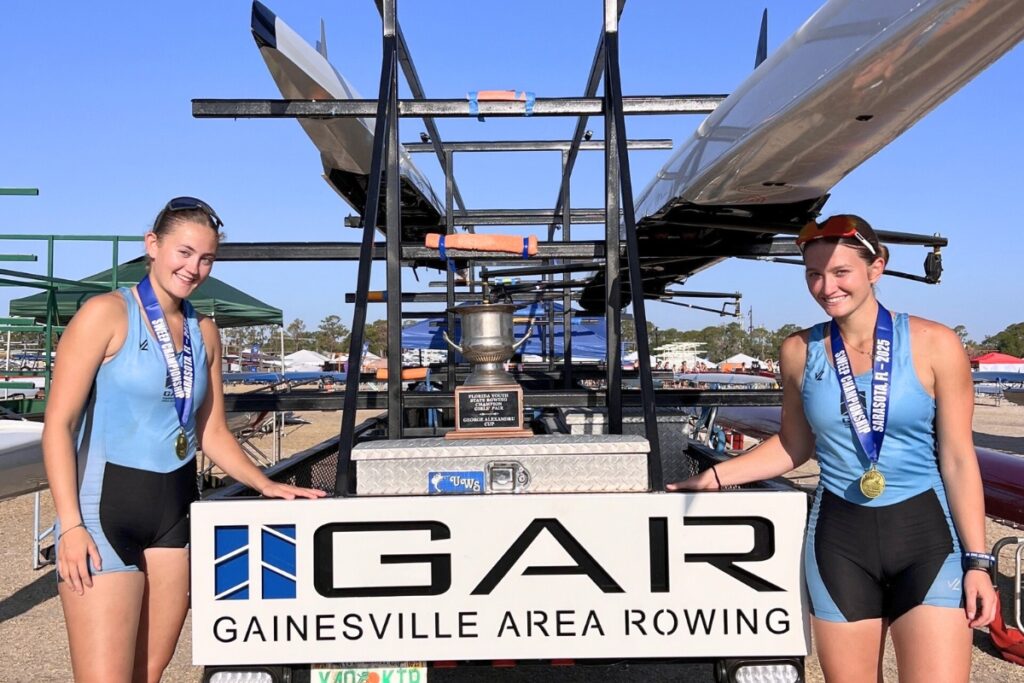 Addy Mathews and Sophie Goldstein pose with the GAR boat trailer (recently refurbished by The Turek Family )
